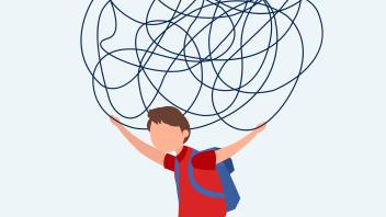 Young boy with backpack holding a ball of confusion over his head